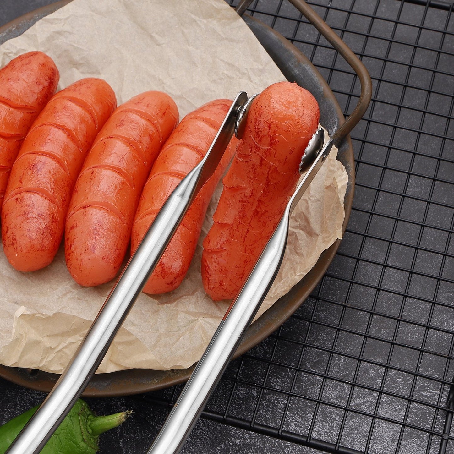 🔥Magic BBQ Sausage Turning Tongs